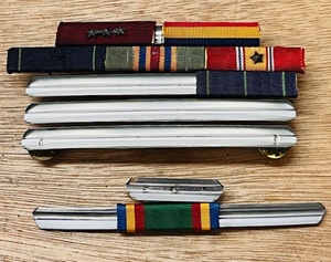 lot 163 image: An Honorable U. S. Navy Seals Ribbon Bar Set