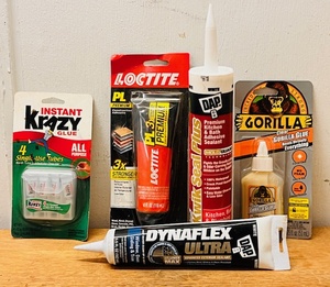 lot 239 image: New Packages & Tubes of Krazy Glue, Loctite PL-3x, Dynaflex Ultra, Kwik Seal Plus, & Gorilla Glue