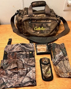 lot 304 image: Cabelas Hunting Equipment Bag & Accessories - Including Leatherman Knife Belt Case, Hunting License Wallet, & AP and Realtree Water Resistant Belt Pouches