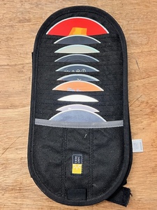 lot 306 image: Case Logic CD Belt Carrying Case W 20 Great CDs - Including the Beatles, Led Zeppelin, ACDC, Boston, Foo Fighters, Nirvana, and More (See Pics)