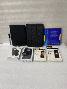 lot 20 image: Lot Of 7 - (2) iPad Cases & (5) Phone Cases - In Condition As Shown
