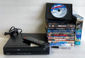 lot 10 image: Lot Of - Skybox Bluray Player & Remote With 12 Movies - In Condition As Shown