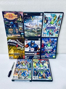 lot 49 image: Lot Of 8 - PC Games The Sims & Madden - In Condition As Shown