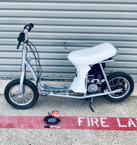 lot 200 image: Razor Electric Scooter Pocket Mod - In Condition As Shown - (READ)