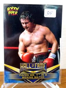 lot 39 image: Rowdy Roddy Piper-WWE-2018 Topps Hall Of Fame Insert-#32 of 40