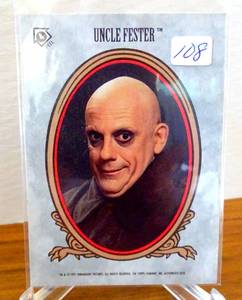 lot 108 image: 1991 Topps The Addams Family Uncle Fester STICKER card #4