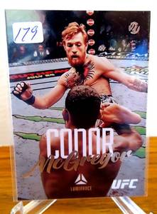 lot 179 image: 2021 UFC Luminance Connor McGregor Pink Parallel No. 52 UFC Chronicles HOF CHAMP