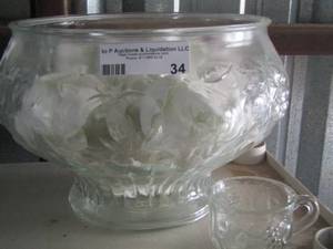 lot 34 image: Clear glass punch bowl has grape design also comes with cups