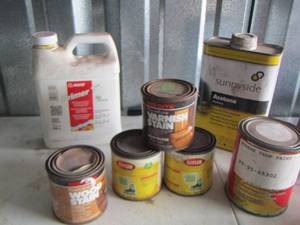lot 57 image: small cans of wood stain, Sunnyside acetone, maple primer