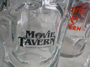 lot 61 image: 4 handled Movie Tavern beer mugs