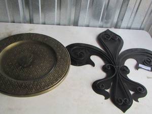lot 69 image: 25x24 Metal Saints art, 18 in diameter Saints round wall art