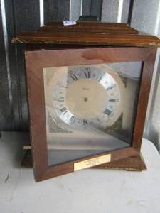 lot 91 image: Bulova Wooden Mantle Clock needs minor work
