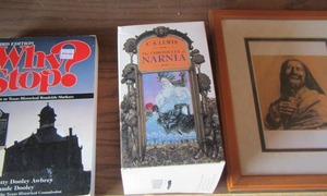 lot 118 image: why stop book, Narnia book, framed portrait