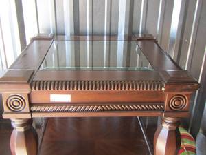 lot 5 image: Glass top wooden side table
