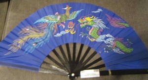 lot 13 image: 24 Dragon and Peacock hand fan blue