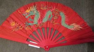 lot 19 image: 24 GREEN DRAGON HAND FAN