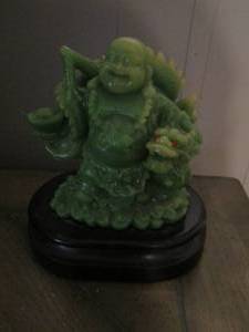 lot 9 image: Buddha statue on stand- 7 12 on stand-- with out stand 5 34 stand is connected, dragon has red eyes no cracks or chips