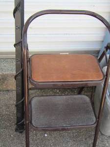 lot 211 image: step stool and a surge protector