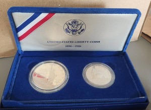 lot 18 image: 1986 Liberty Half Dollar and Liberty Silver Dollar Set