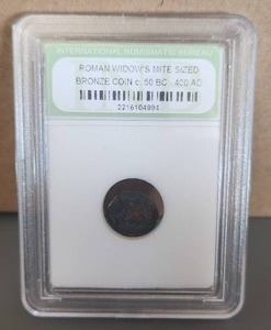 lot 86 image: Roman widow mite sized bronze coin