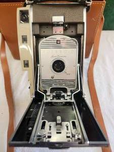 lot 102 image: Vintage Polaroid Land Camera with case and accessories - Model 150
