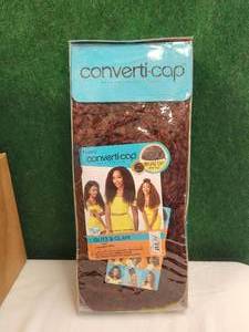 lot 223 image: Selection of Outre cover up cap wigs