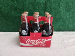 lot 239 image: Collectible 6 pack Coca Cola - Dallas Cowboy full coke bottles