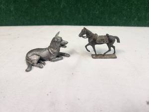 lot 269 image: Pewter dog and lead horse