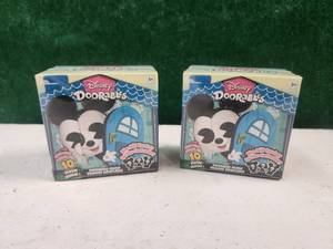 lot 303 image: Selection of 2 Disney Doorables - 10 plush toys