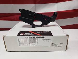 lot 406 image: Lancer L15 Stripped Forged Lower Receiver w Standard Mag Well Extension