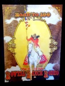 lot 167 image: AWESOME BUCK TAYLOR ROWELL RANCH RODEO ROAD TO 100 POSTER - 18 X 24