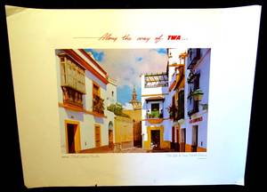 lot 170 image: RARE ORIGINAL 1950 TRANS WORLD AIRLINES (TWA) SPAIN STREET SCENE IN SEVILLE ADVERTISING ONE SHEET - 17 X 22