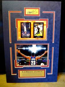 lot 210 image: CUSTOM MATTE DISPLAY OF NBA GREAT LeBRON JAMES - NICE PHOTOS AND METAL BIO AND SIGNATURE PLATES