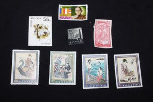 lot 14 image: Stamps Variety of Vintage Mostly Uncirculated Foreign Postage Stamps