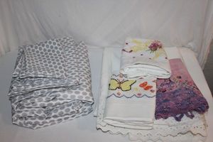 lot 102 image: Linens Twin Sheet Sets with Extra Set of Pillow Cases Table Clothes, Cross Stitch Sheet and Pillow Case