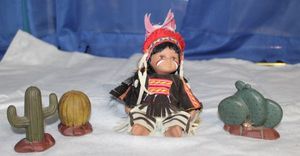 lot 26 image: Vintage Show Stoppers Porcelain doll Little Indian with Cacti