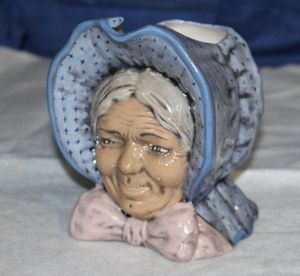 lot 12 image: Blue Ridge China Pioneer Women Pitcher, Southern Potteries Toby Face Jug