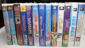 lot 136 image: Variety of VHS Tapes, Titles Shown in Photos