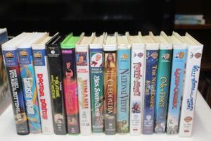 lot 137 image: Variety of VHS Tapes, Titles Shown in Photos