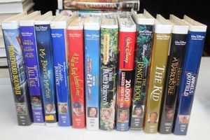 lot 144 image: Variety of VHS Tapes, Titles Shown in Photos