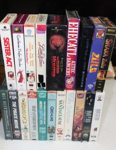 lot 142 image: Variety of VHS Tapes, Titles Shown in Photos