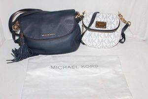 lot 3 image: Michaels Kors Convertible Cross Body Purses. More information below