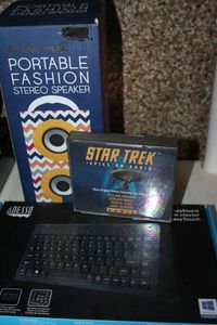 lot 67 image: Blue Tooth Speaker, Mini Keyboard and Star Trek CDs