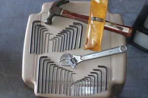 lot 77 image: Tools Craftsman Allen Wrenches, both standard and metric regular and long in both standard an metric as well as Crescent Wrench and Hammer, also Craftsman