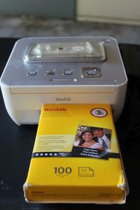lot 222 image: Kodak Easy Share Photo Printer with Photo Paper, Powers on