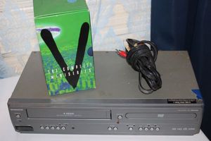 lot 272 image: Magnavox 4 Head VHS Player and DVD Combo and V The complete Miniseries on VHS