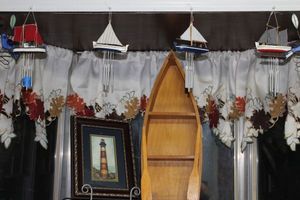 lot 280 image: Sailboat Wind Chimes, with wooden Decroative Boat and Light House Picture