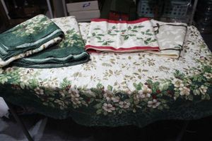 lot 305 image: Matching Christmas Table Clothes, Runner and Placemats. 2 Round Table Clothes 1 Retangle Table Cloth