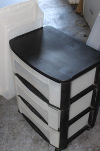 lot 319 image: Three Drawer Plastic Dresser and Thin Under Bed Tote