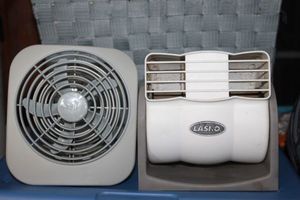 lot 323 image: Lasko Personal Heater and Battery Operated  Fan